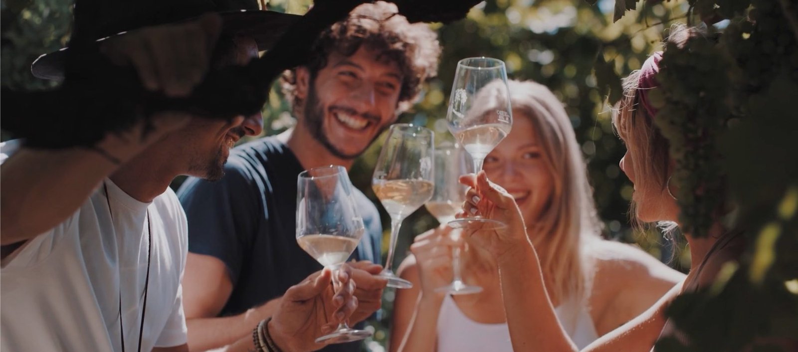Family drinking wine in Italy