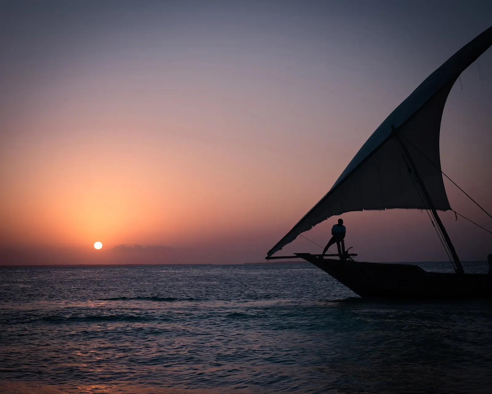 Traditional fishing boat on waters around Dar Es Salaam, Zanzibar, Tanzania