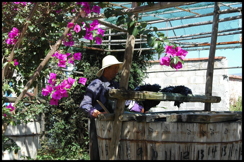 A Bai artisan working with indigo tie-dye in Dali, Yunnan